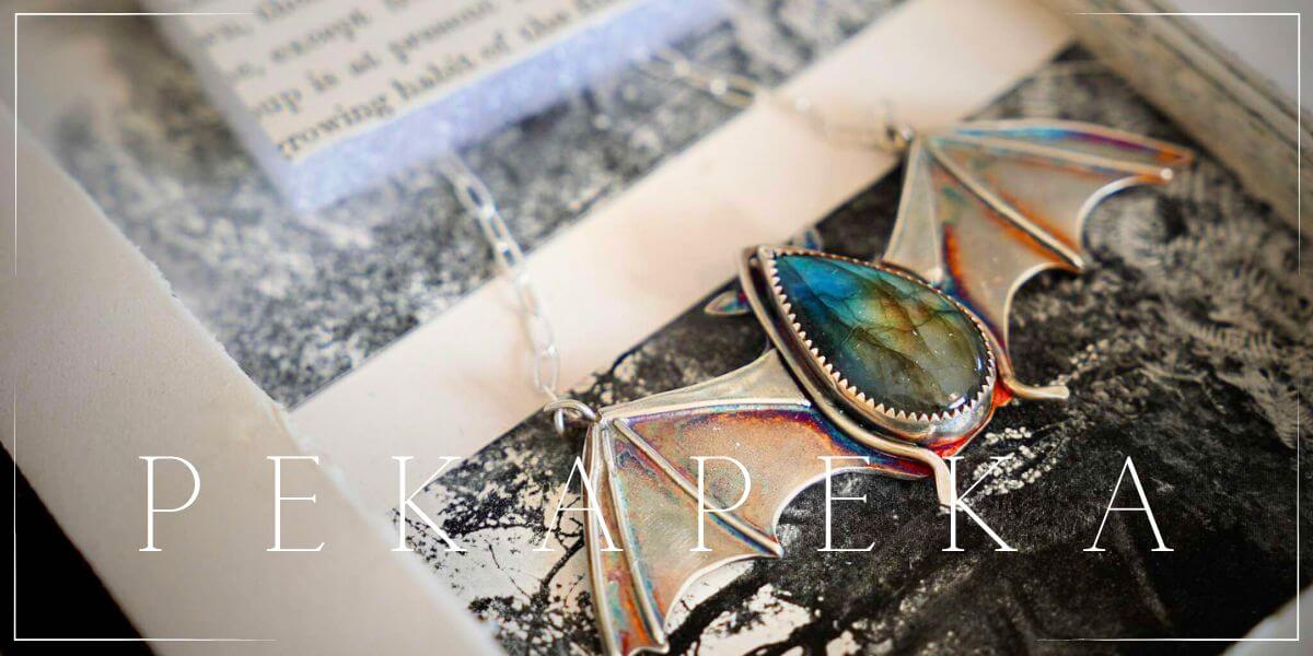 view the pekapeka bat jewellery mini collection